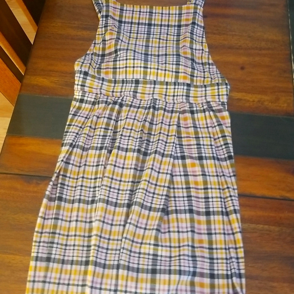 I'm am selling a really pretty dress that can go over a shirt